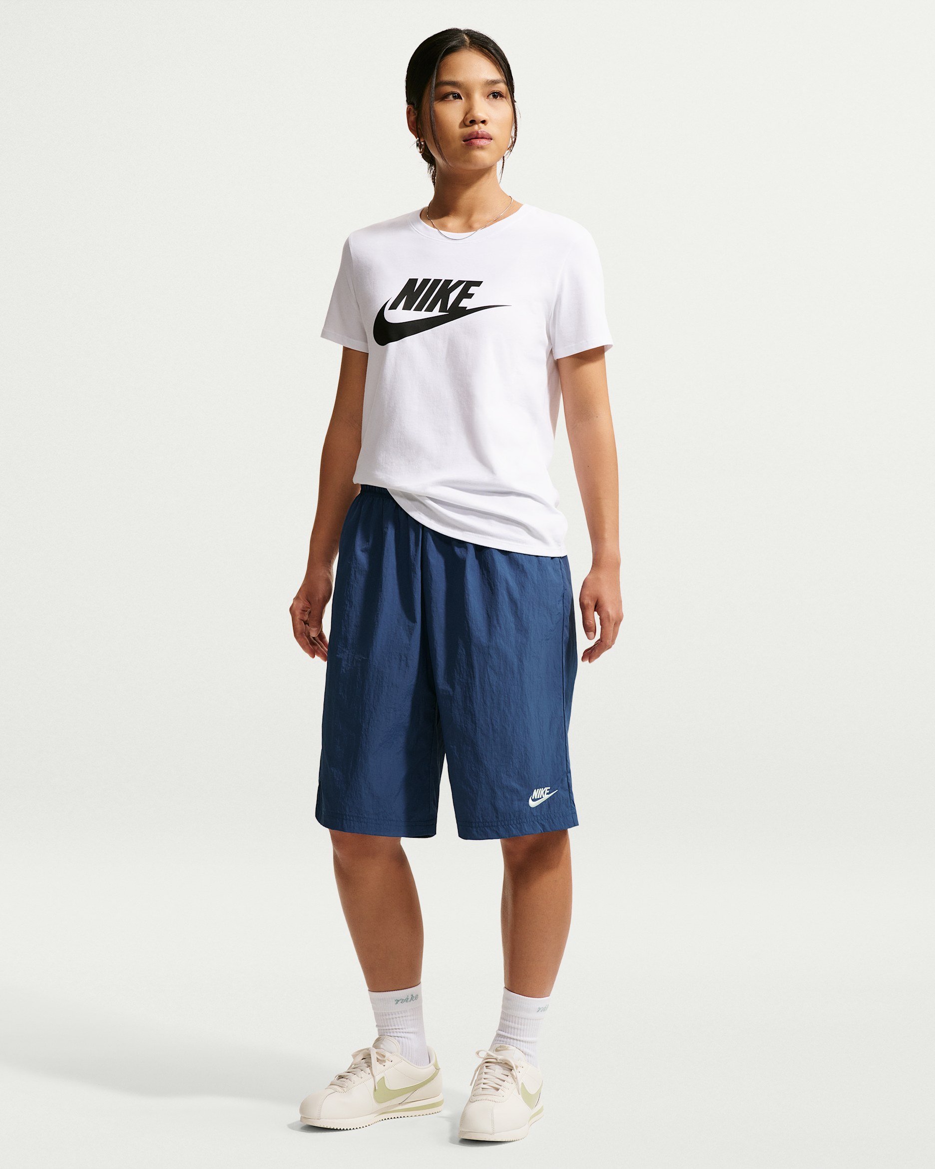 Nike Sportswear Women's Mid-Rise Loose Knee-Length Shorts. Nike ID